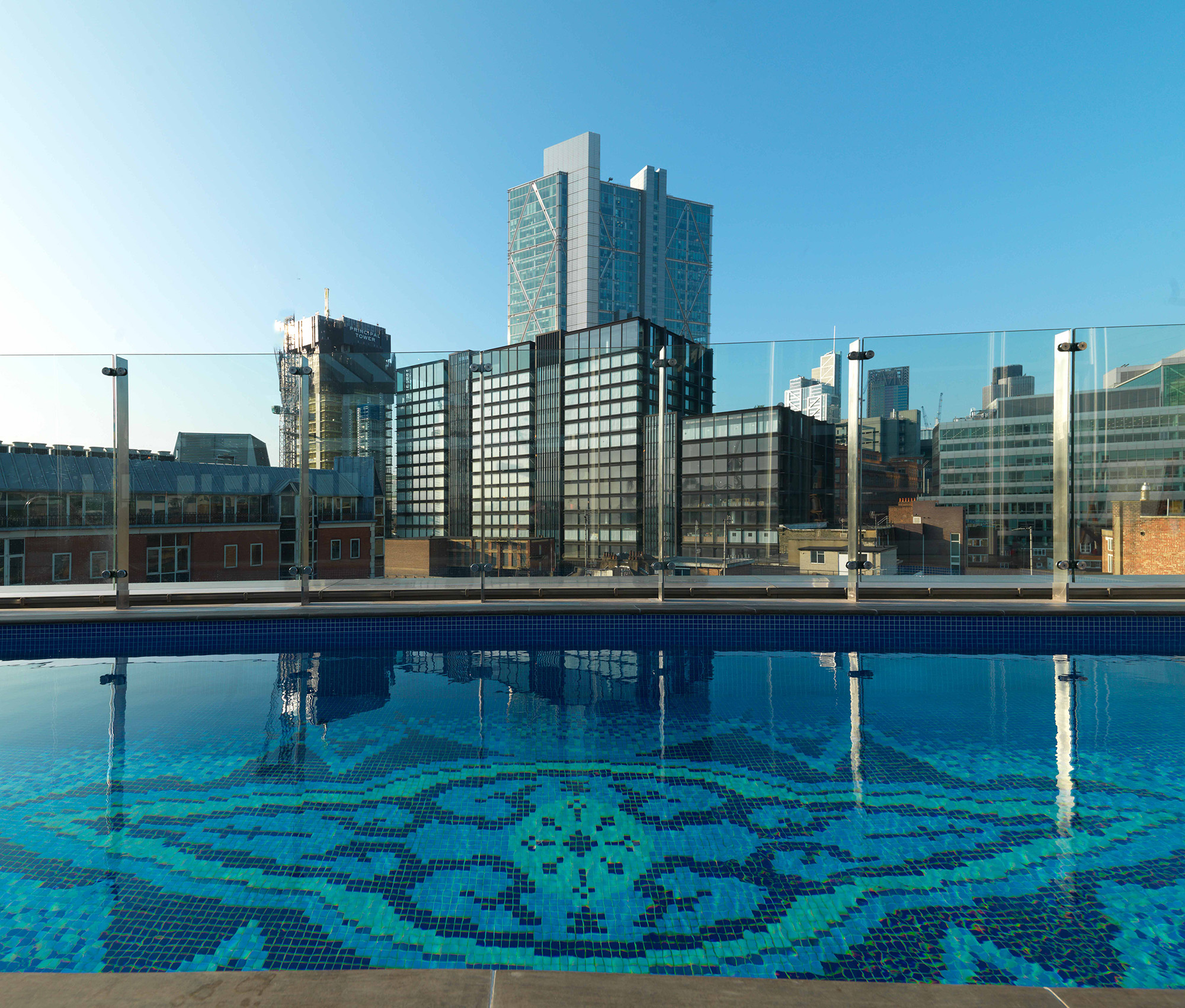 View of city from pool at The Curtain