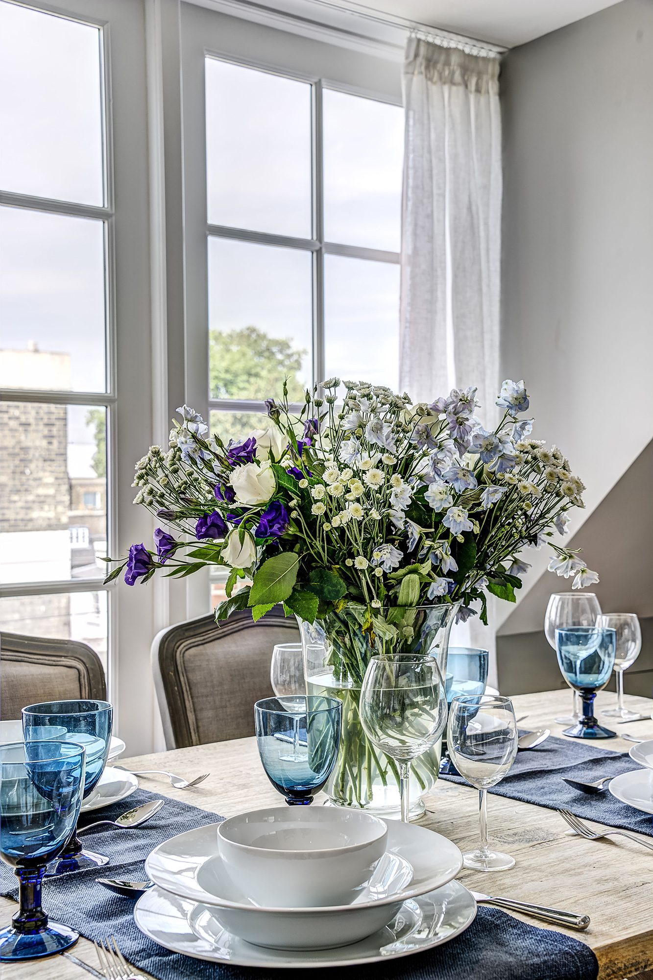 Flowers on dining table at Newton Road luxury renovation